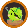 a circular icon with an orange outline, the center of which shows a green junimo dressed like a pirate, with a black eyepatch over one eye and a hook for an arm